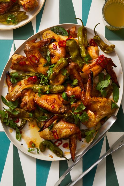 garlicky wings and shishito peppers in a bowl
