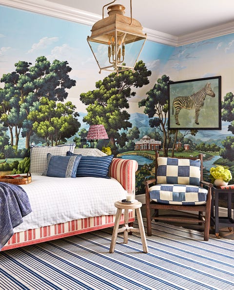 gender neutral nursery with wall mural