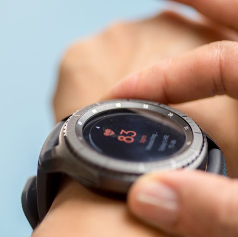 Generic design smartwatch. Touching screen. Pulse checking. heart rate monitor during jogging