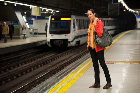 Stand while waiting for the train.