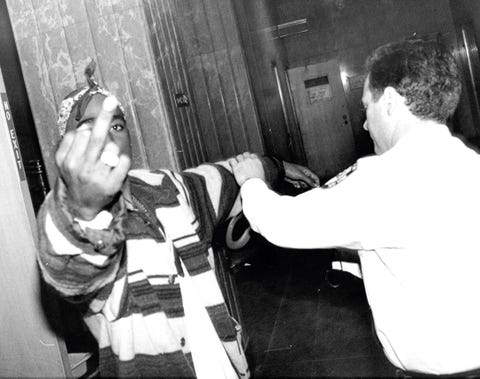 ESQ060121_099 tupac shakur tupac shakur spitting at photographers july 05, 1994 photo by bolivar arellanonew york postphoto archives, llc via getty images
