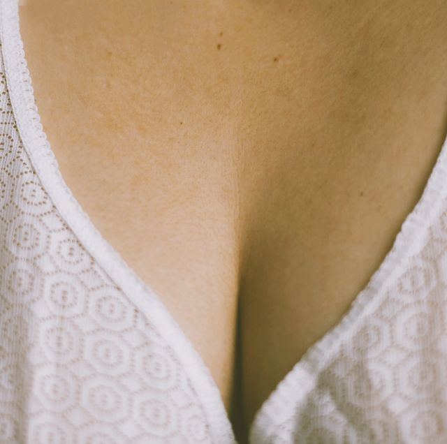Midsection Of Woman Wearing Bra