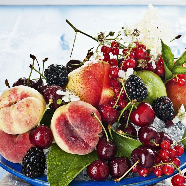 an arrangement of fruit and berries