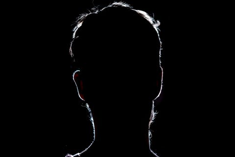 lighten portrait silhouette of a human head in the dark background lighten portrait silhouette of a human head in the dark background