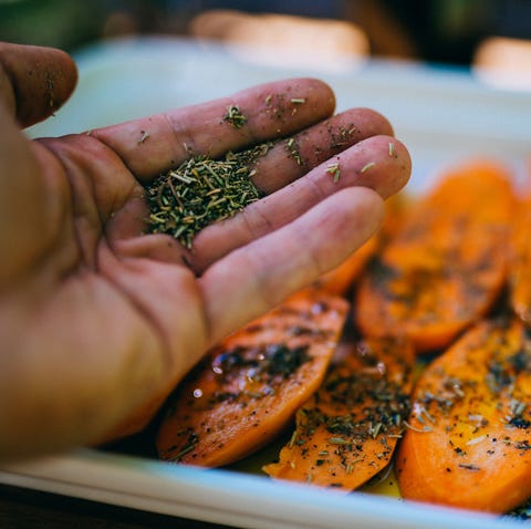 Preparing sweet potato for bbq.