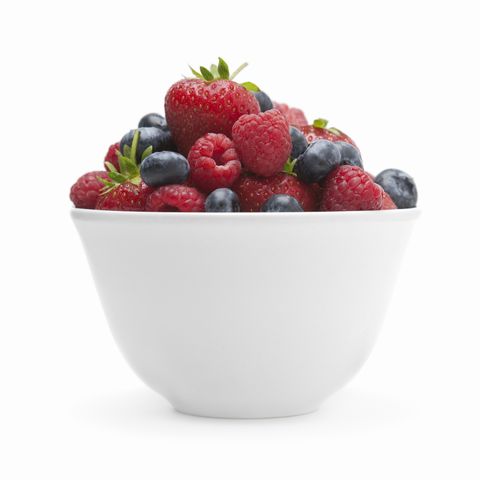 A small white bowl of soft fruit.