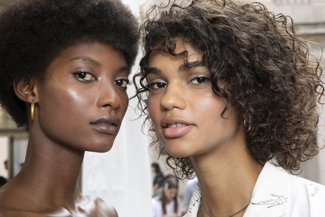 milan, italy   september 21  l r mame thiane camara and barbara valente  are seen backstage ahead of the blumarine show during milan fashion week springsummer 2019 on september 21, 2018 in milan, italy  photo by rosdiana ciaravologetty images