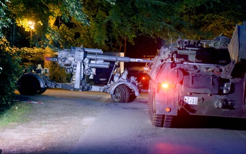 German police removes collected WWII weapons a wwii era 88 centimeter anti aircraft gun l is prepared to be removed from from a residential property in heikendorf, germany, 02 july 2015 since 01 july, police and german armed forces are removing recently discovered military equipment from world war ii including the panther tank, weapons and a torpedo an armoured recovery vehicle r was used for the safe transportation of the weapons photo carsten rehderdpa usage worldwide photo by carsten rehderpicture alliance via getty images