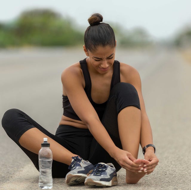 Mujer lesionada practicando running Mujer, lesionado,running