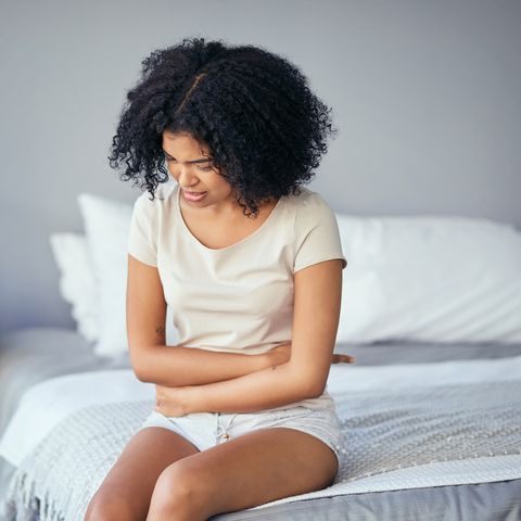 woman with tummy ache - IBS symptoms 
