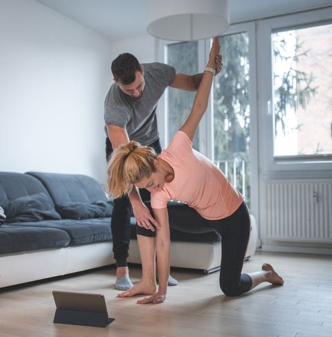Couple working out at home