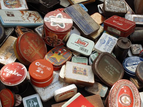Vintage tin boxes for sale in a German flea market