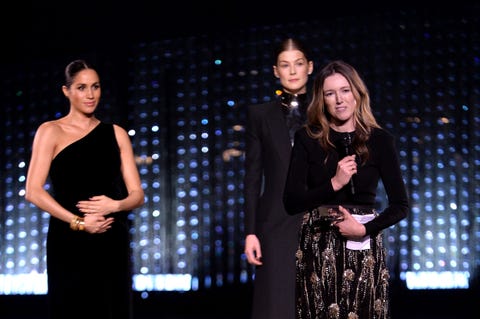 Meghan Markle at the fashion awards with Clare Waight Keller Givenchy Meghan Markle holds her bump at fashion awards - meghan markle pregnant