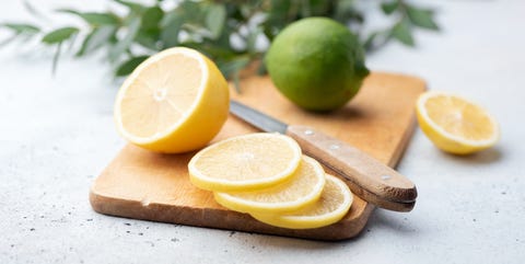 Citrus slices on wooden board