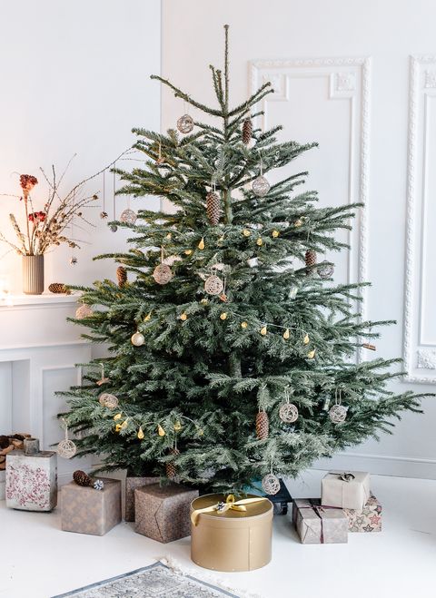 minimal scandinavian decorated christmas tree with presents boxing day 2018