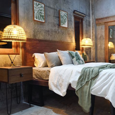 Luxury concrete bedroom at night