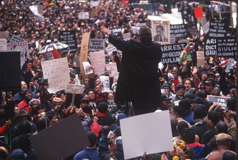 a crowd protesting the shooting of unarmed immigrant amadou diallo