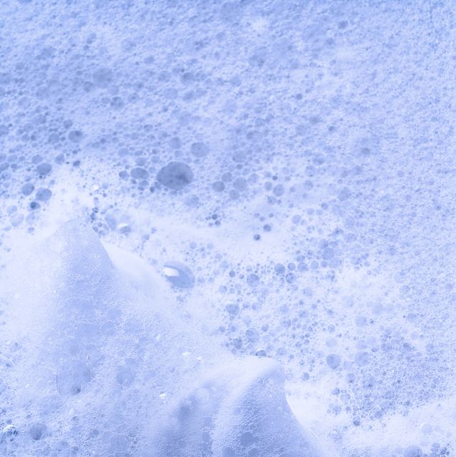 Wave of bubbles in water with a blue color