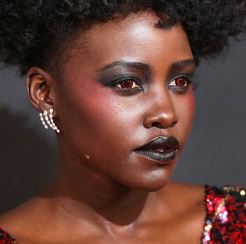 Lupita Nyong'o Wore Red Contacts at The London Premiere of Us