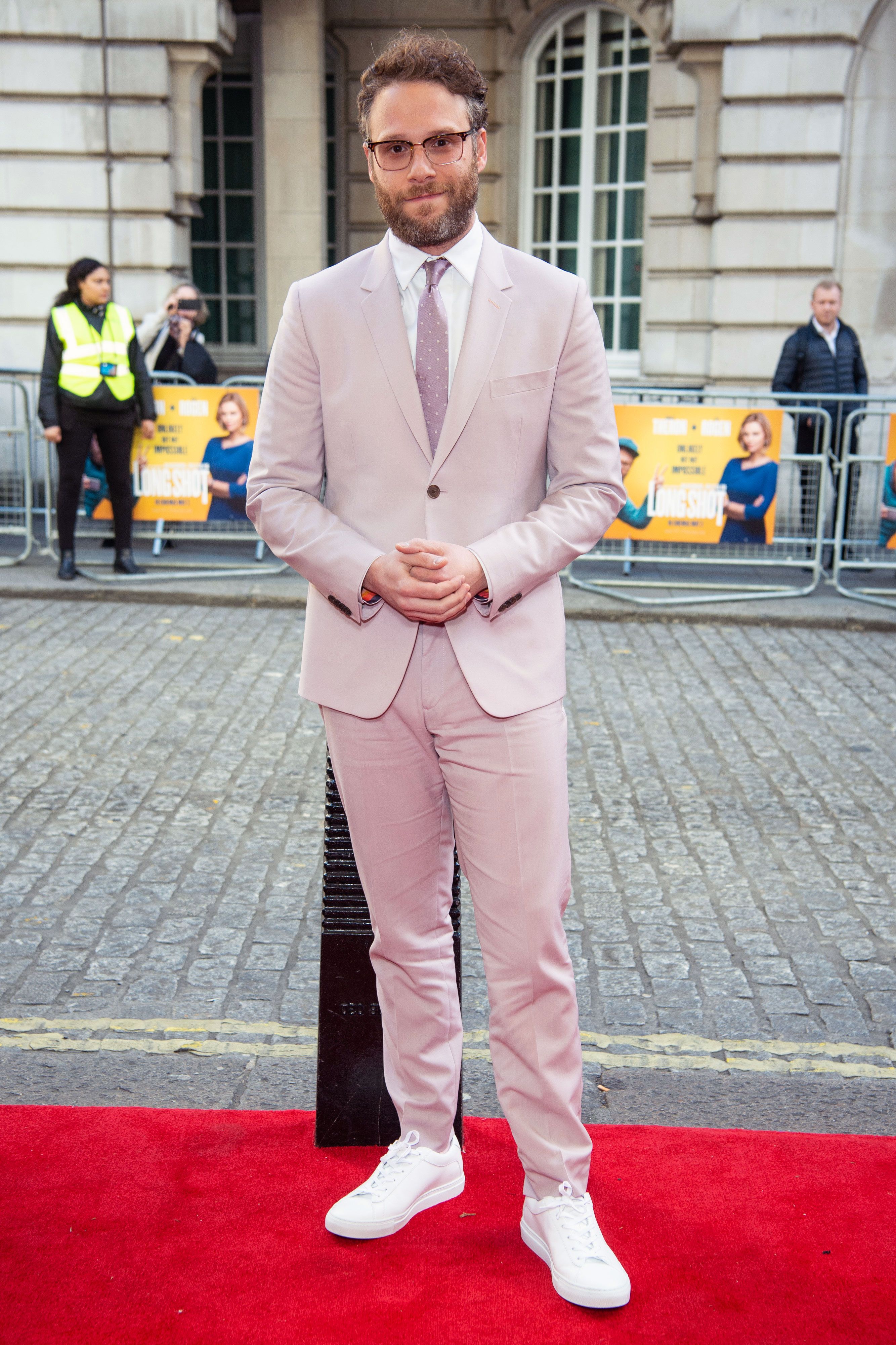 Seth Rogen Looks Great In The Pink Suit Trend While Promoting Long