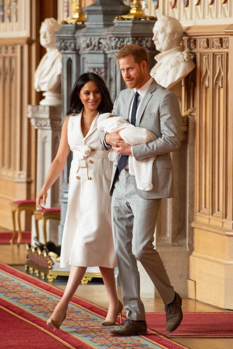 Windsor, England, 08 May Prince Harry, Duke of Sussex and Meghan, Duchess of Sussex, pose with their newborn son Archie Harrison Mountbatten Windsor during a photo discussion in the George Hall at Windsor Castle on 8 May 2019 in Windsor, England the Duchess of Sussex gave birth on Monday 06 May 2019 at 0526 by photo by Dominic Lipinski WPA Poolgetty Images