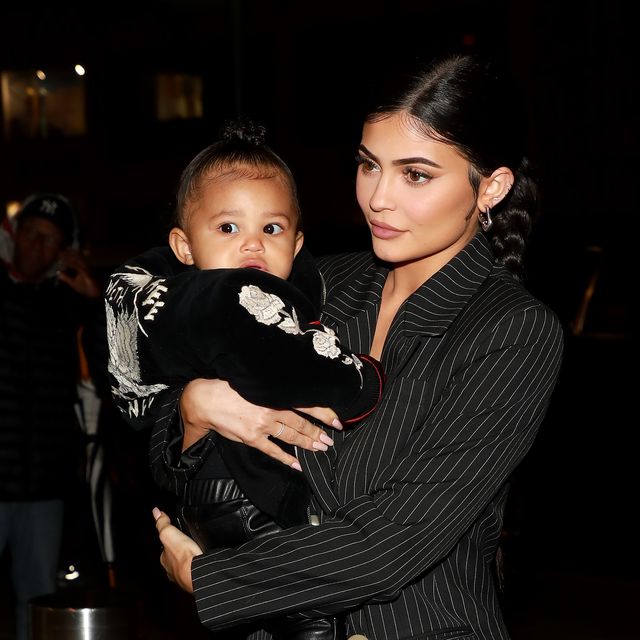 kylie jenner dubs stormi the 'coolest baby' as tot holds louis vuitton purse