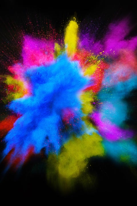Beautiful powder explosion in all directions with vivid colors and black background. Beautiful powder explosion in all directions with vivid colors and black background.