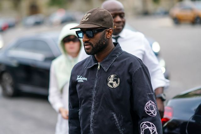 paris, france   june 23 virgil abloh wears a brown vuitton cap, a jacket with patches, outside celine, during paris fashion week   menswear springsummer 2020, on june 23, 2019 in paris, france photo by edward berthelotgetty images