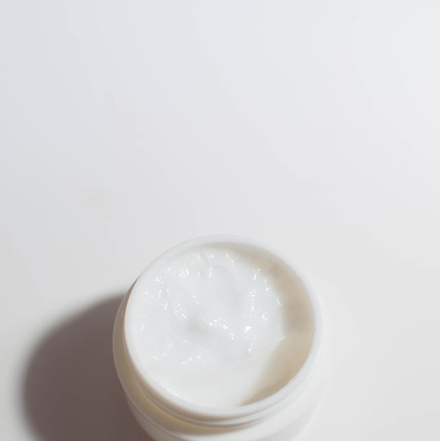 A still life of beauty cream on a white background
