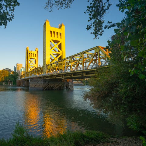 Tower Bridge and Sacramento, California Skyline tower bridge and sacramento, california downtown skyline reflecting in sacramento river