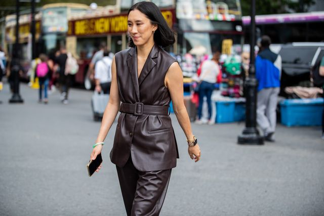 eva chen is seen wearing a brown belted leather vest and pants, along with her signature jade bracelet, during new york fashion week september 2019