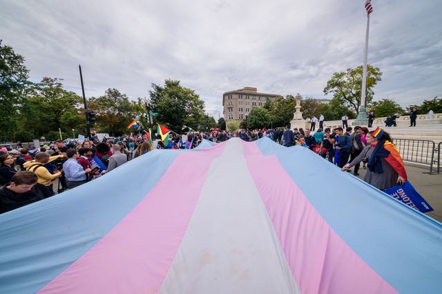 washington dc, united states   20191008 a giant trans flag unfurled outside the supreme court 133 protesters were arrested blocking the street across the supreme court in an act of non violent civil disobedience, as hundreds of lgbtq advocates convened in washington, dc for a national day of action as a community response to the landmark supreme court hearings that could legalize workplace discrimination, primarily against lgbtq people, on the basis of sexual orientation, gender identity, and gender presentation photo by erik mcgregorlightrocket via getty images