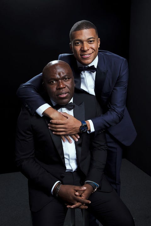 milan, italy   september 23 the fifa fifpro mens world11 award finalist kylian mbappe of paris saint germain and france poses for a portrait in the photo booth with his father prior to the best fifa football awards 2019 at excelsior hotel gallia on september 23, 2019 in milan, italy photo by michael regan   fifafifa via getty images