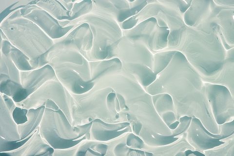 cosmetic transparent cream gel texture smudge background