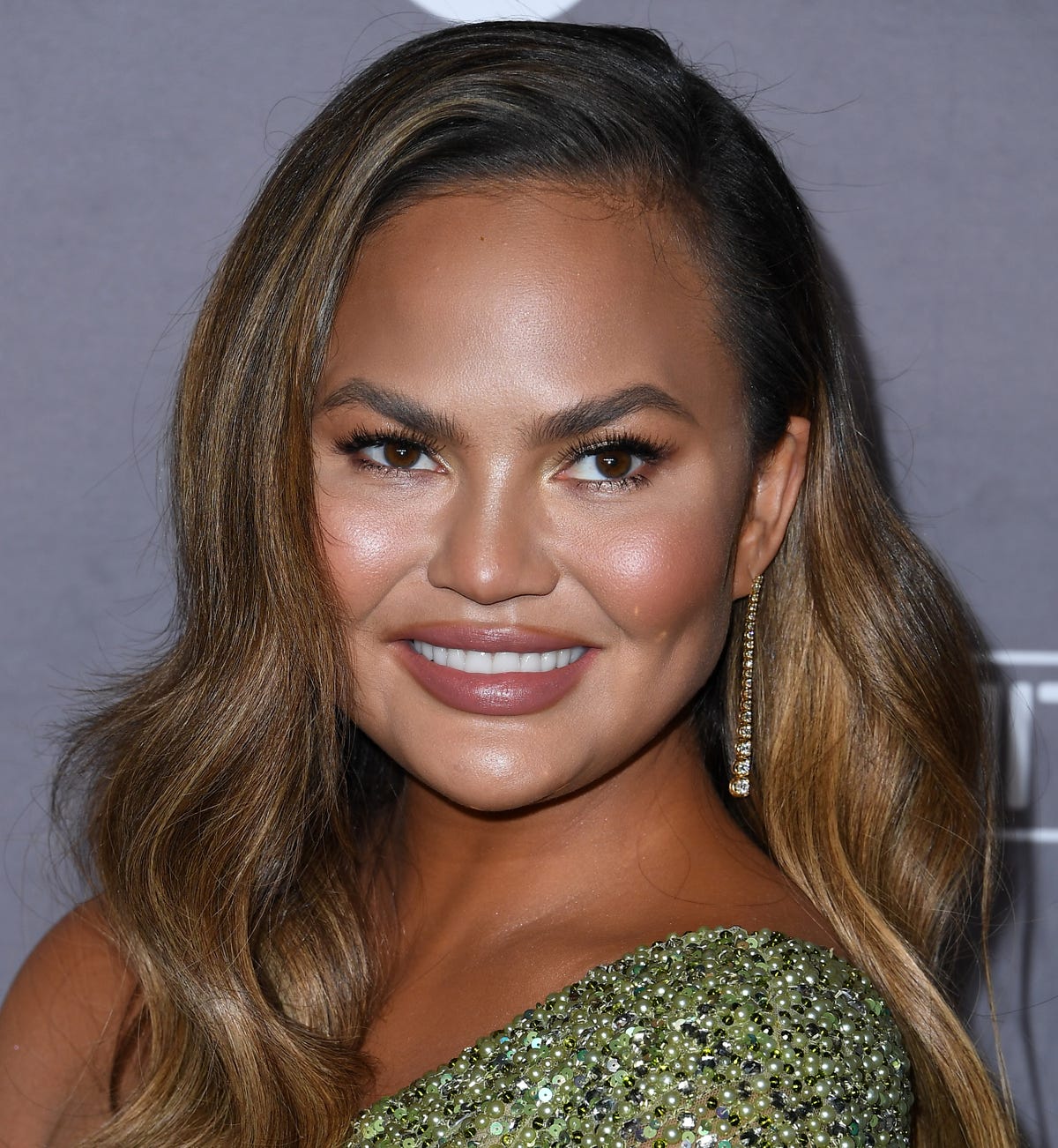 Chrissy Teigen Revealed Why She Takes 'Night Eggs' to Bed