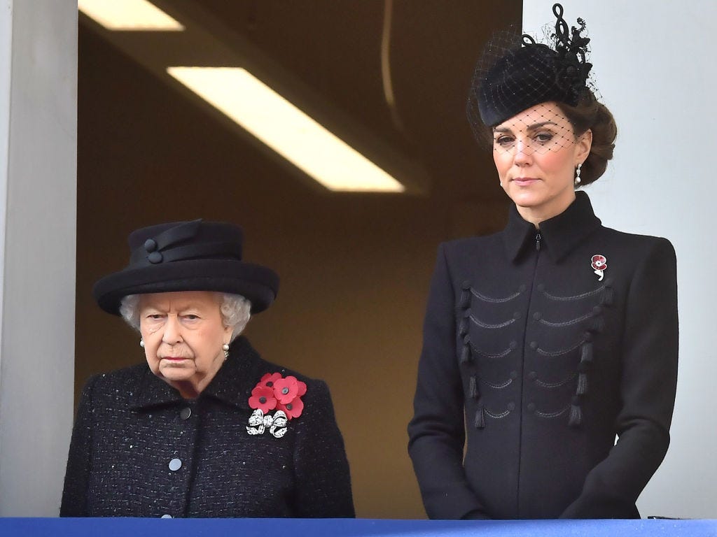 Kate Middleton joins the Queen on the balcony for Remembrance Sunday