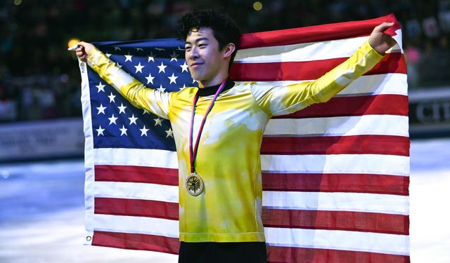 winner usas nathan chen poses with his medal and the us flag after the men free skating program on december 7, 2019 at the isu grand prix of figure skating final 2019 in turin photo by marco bertorello  afp photo by marco bertorelloafp via getty images