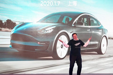 tesla ceo elon musk gestures during the tesla china made model 3 delivery ceremony in shanghai   tesla ceo elon musk presented the first batch of made in china cars to ordinary buyers on january 7, 2020 in a milestone for the companys new shanghai giga factory, but which comes as sales decelerate in the worlds largest electric vehicle market photo by str  afp  china out photo by strafp via getty images