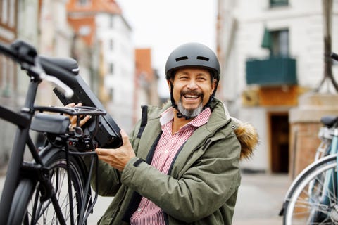 smiling man is so happy with bicycle