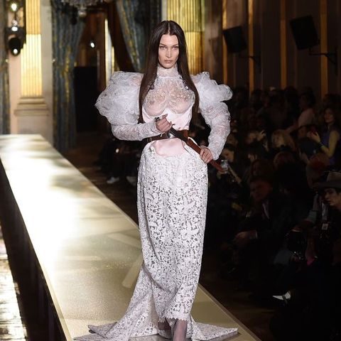 Bella Hadid Frees The Nipple In A Wedding Gown During PFW