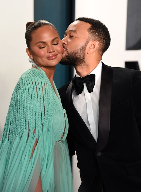 beverly hills, california   february 09 chrissy teigen and john legend attend the 2020 vanity fair oscar party hosted by radhika jones at wallis annenberg center for the performing arts on february 09, 2020 in beverly hills, california photo by karwai tanggetty images