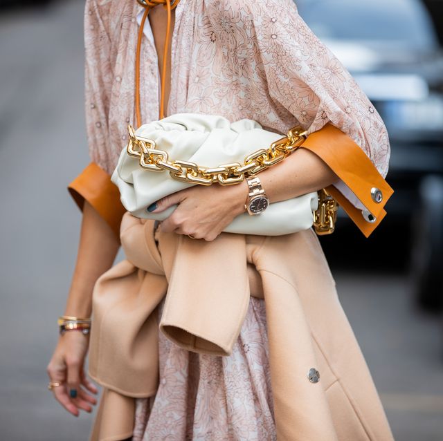 milan, italy   february 21 viktoria rader is seen wearing bottega bag, rolex day date watch, pink dress, camel coat outside sportmax during milan fashion week fallwinter 2020 2021 on february 21, 2020 in milan, italy photo by christian vieriggetty images
