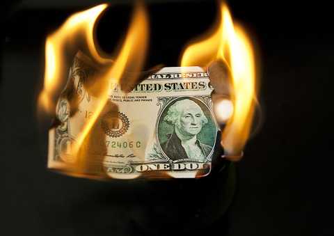a burning us dollar bill, london, 8th august 2011 photo by tom stoddartgetty images