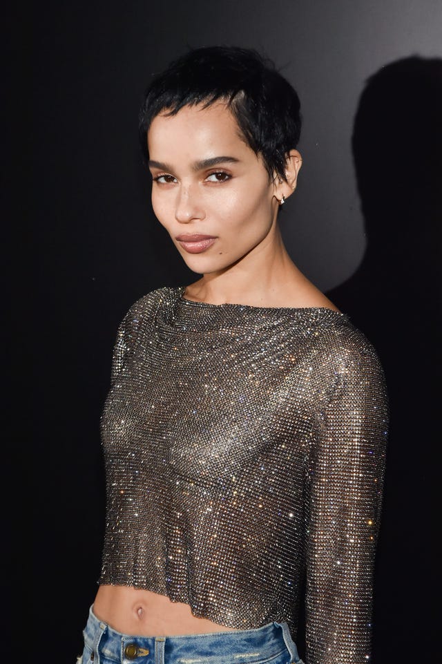 Zoe Kravitz Styled a Band Tee With a Pleated Skirt and Mary-Janes