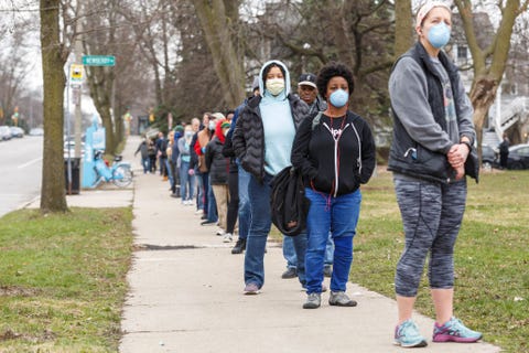 WISCONSINPRIMARY milwaukee, wi april 7 a line to vote in wisconsins spring primary election wraps around for blocks and blocks on tuesday, april 7, 2020 at riverside high school in milwaukee, wi photo by sara stathas for the washington post