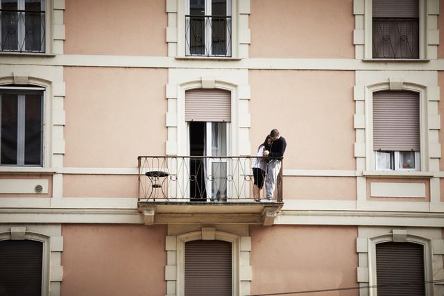 milan, italy   march 27 people spend a lot of time on balconies or looking out of windows due to quarantine restrictions during the covid 19 pandemic on march 27, 2020 in milan, italy the italian government continues to enforce the nationwide lockdown measures to control the spread of covid 19 the coronavirus covid 19 pandemic has spread to at least 182 countries, claiming over 20,000 lives and infecting hundreds of thousands more photo by lorenzo palizzologetty images