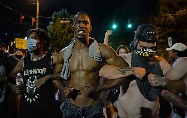 charlotte, usa   may 30  following the death of george floyd in minneapolis, protest in downtown charlotte turn violent in nc, united states on may 30, 2020 photo by peter zayanadolu agency via getty images