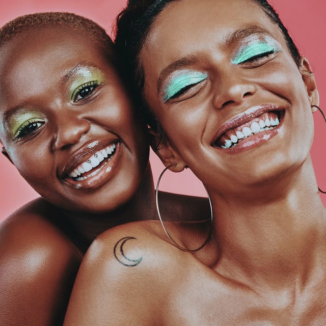 We look good with or without makeup shot of two beautiful young women posing together against a pink background