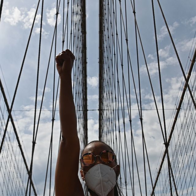 protesters gather to demonstrate the death of george floyd on june 4, 2020 on top of the brooklyn bridge in new york   on may 25, 2020, floyd, a 46 year old black man suspected of passing a counterfeit 20 bill, died in minneapolis after derek chauvin, a white police officer, pressed his knee to floyds neck for almost nine minutes photo by angela weiss  afp photo by angela weissafp via getty images