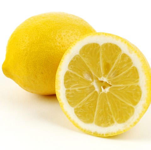 Whole and halved lemon